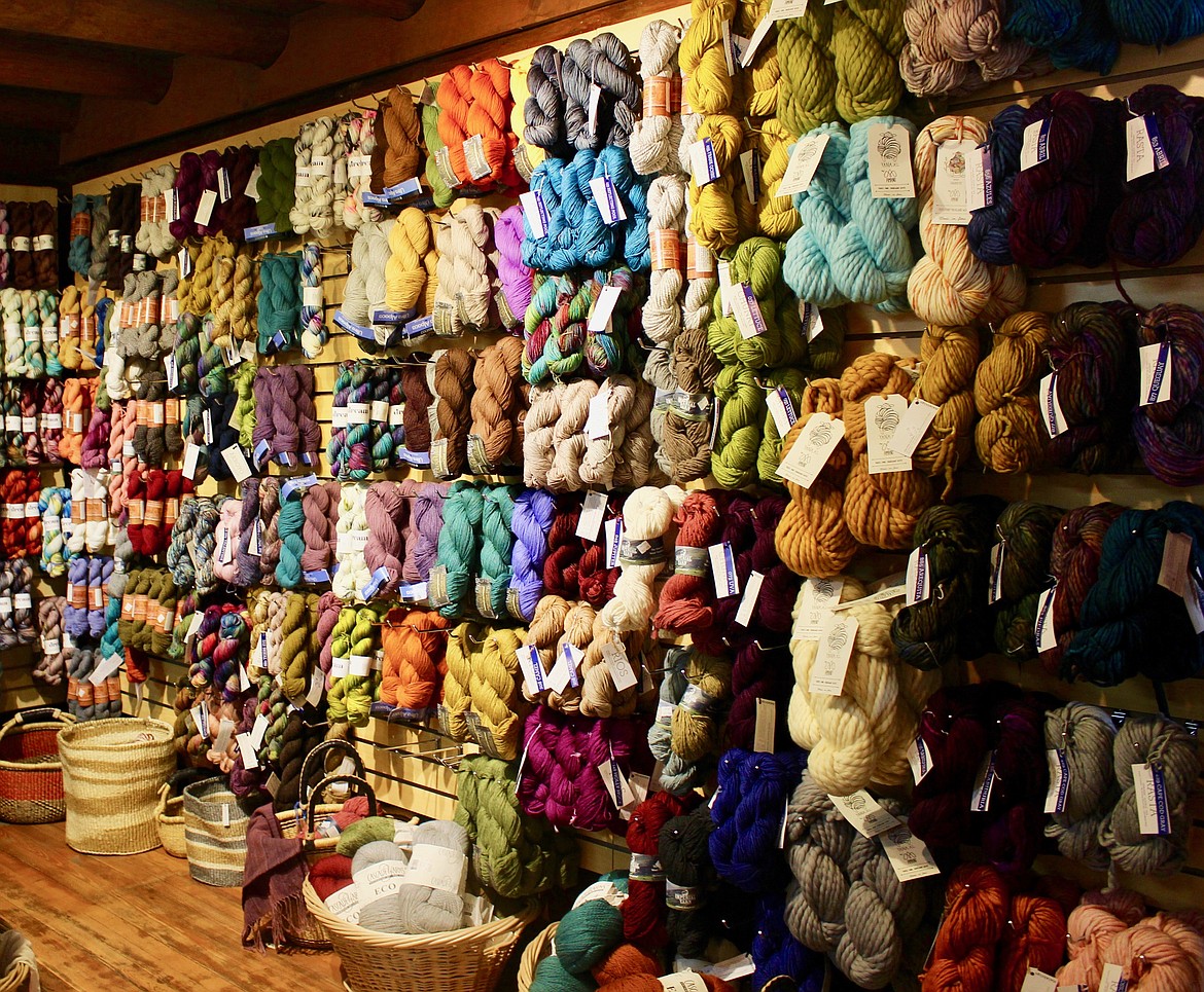 A wall of colorful yarn at Fiber in Bigfork. (Taylor Inman/Bigfork Eagle)