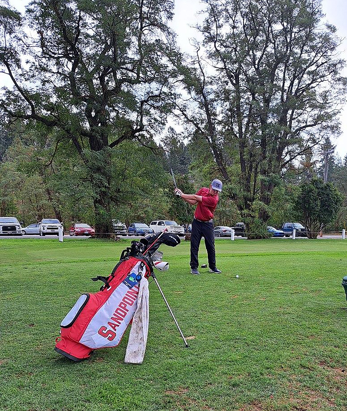 Jake Samuels gets ready to swing during a recent golf match for the Bulldogs. The Sandpoint golfer led the Bulldogs with 85 as both the boys and girls teams won districts at The Idaho Club on Thursday.