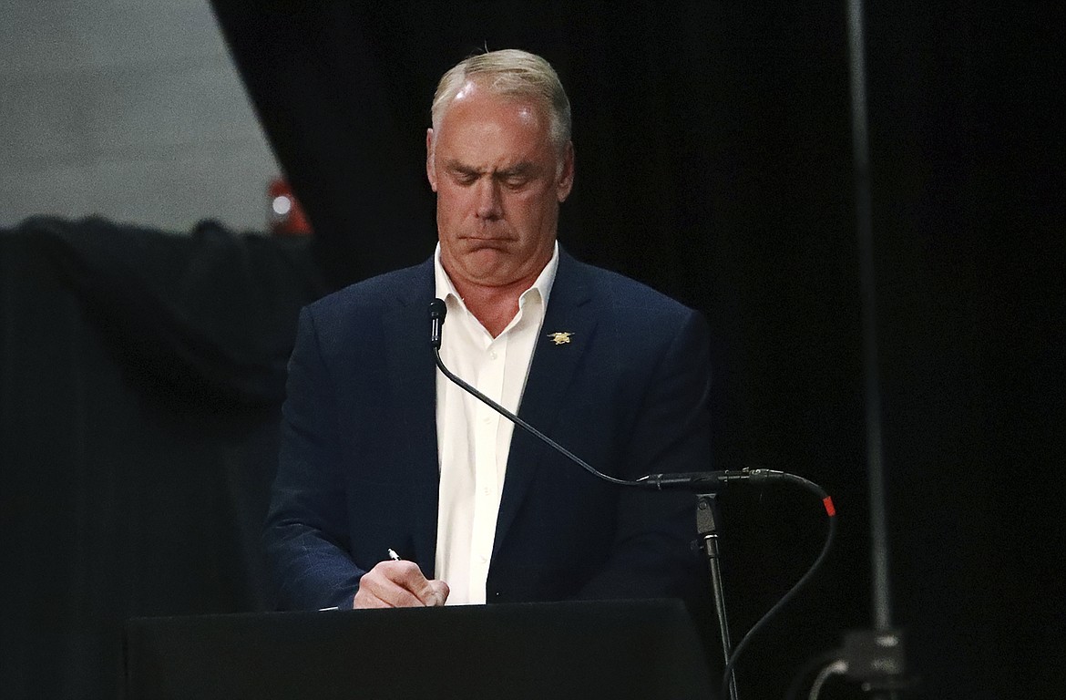 Republican candidate in the race for Montana's western congressional district Ryan Zinke reacts as another candidate answers a question during a forum in Butte, Mont., Thursday, Sept. 29, 2022. (Meagan Thompson/The Montana Standard via AP)