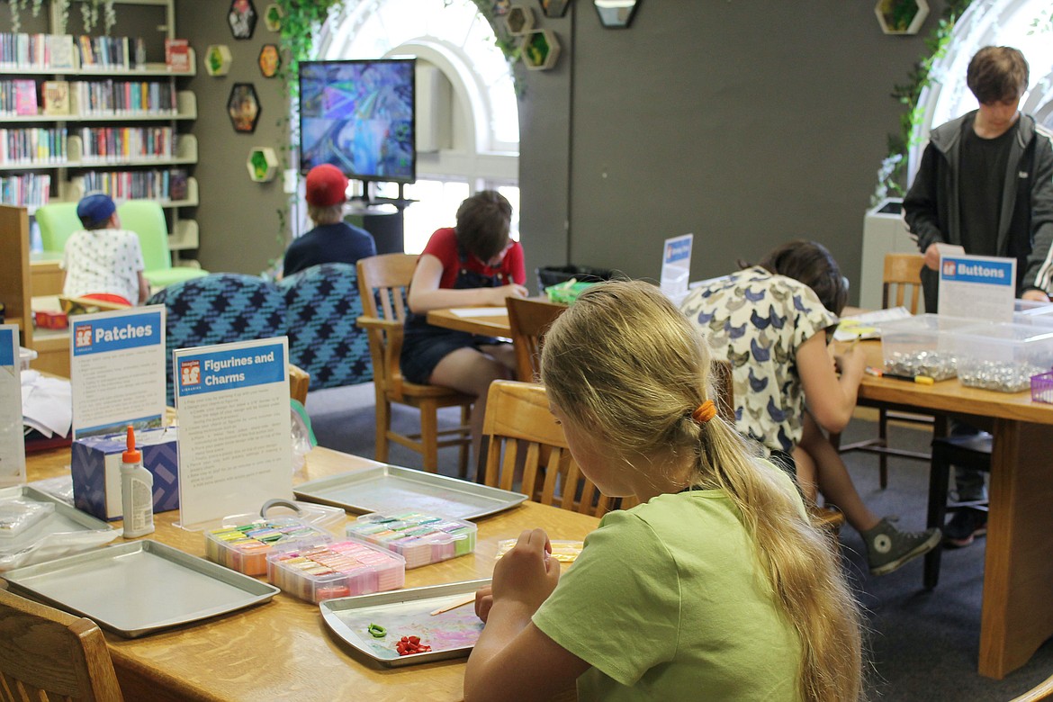 Teens explore creative activities at the newly remodeled ImagineIF Kalispell Teen Zone. — Photo by Lune Axelsen