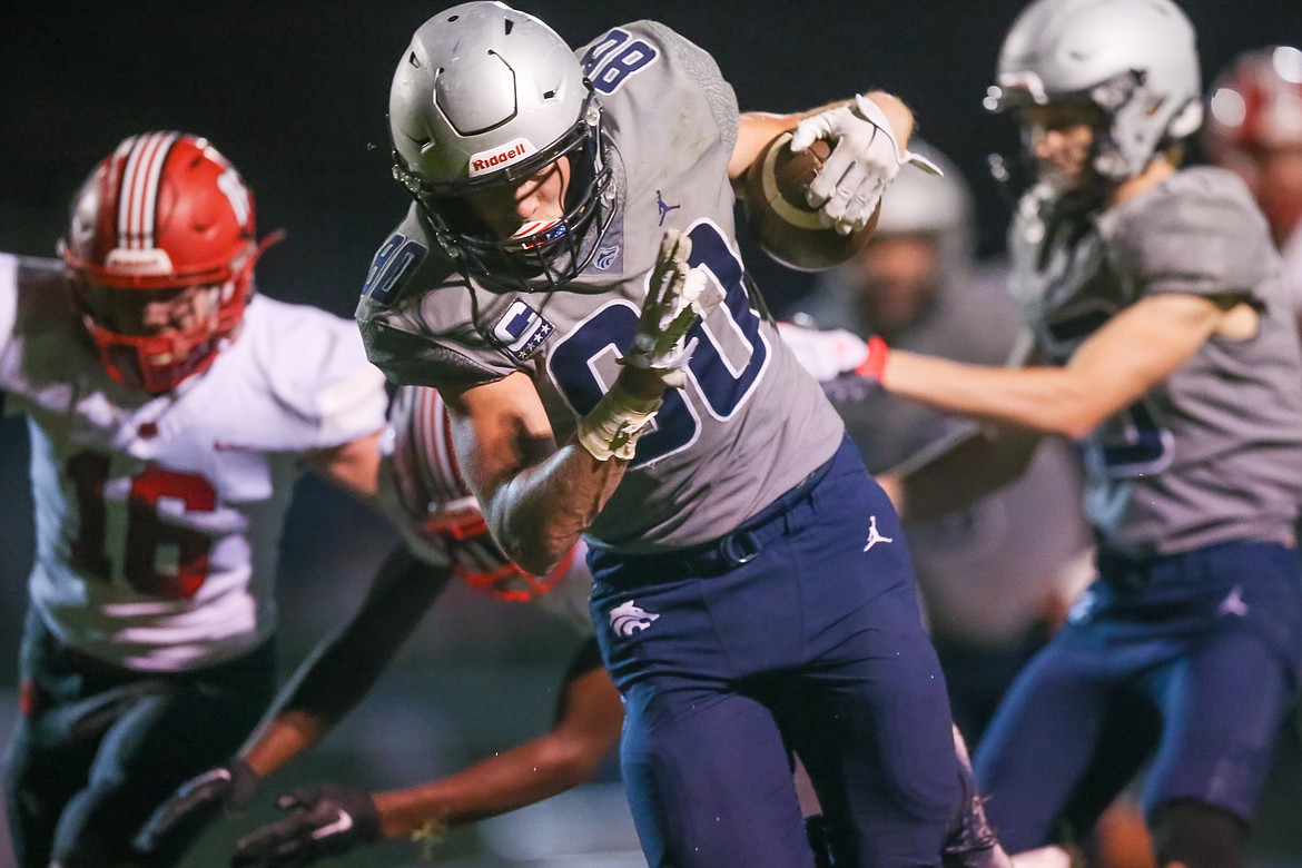 JASON DUCHOW PHOTOGRAPHY
Zach Johnson of Lake City breaks away for a 22-yard touchdown run on Friday night against Sandpoint.