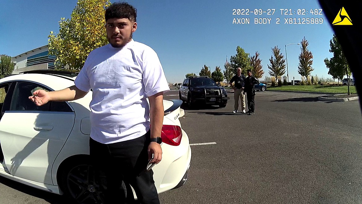 A still of Leonel Balderas-Mondragon taken from an MLPD officer’s body cam in the parking lot of the Columbia Basin Technical Skills Center on Wednesday. Balderas-Mondragon, 22, was arrested for allegedly threatening several students with a handgun in the CB Tech parking lot.