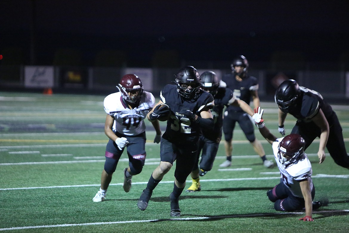 Royal senior running back Kaleb Hernandez bursts through to the end zone on a 25-yard touchdown run.