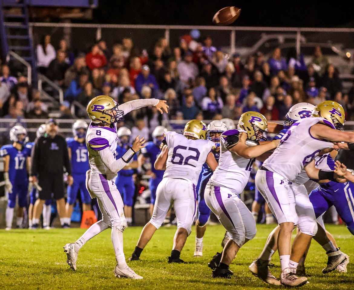 Polson senior quarterback Jarrett Wilson leads a stunning comeback against the Wildcats on Friday in Columbia Falls. (JP Edge/Hungry Horse News)