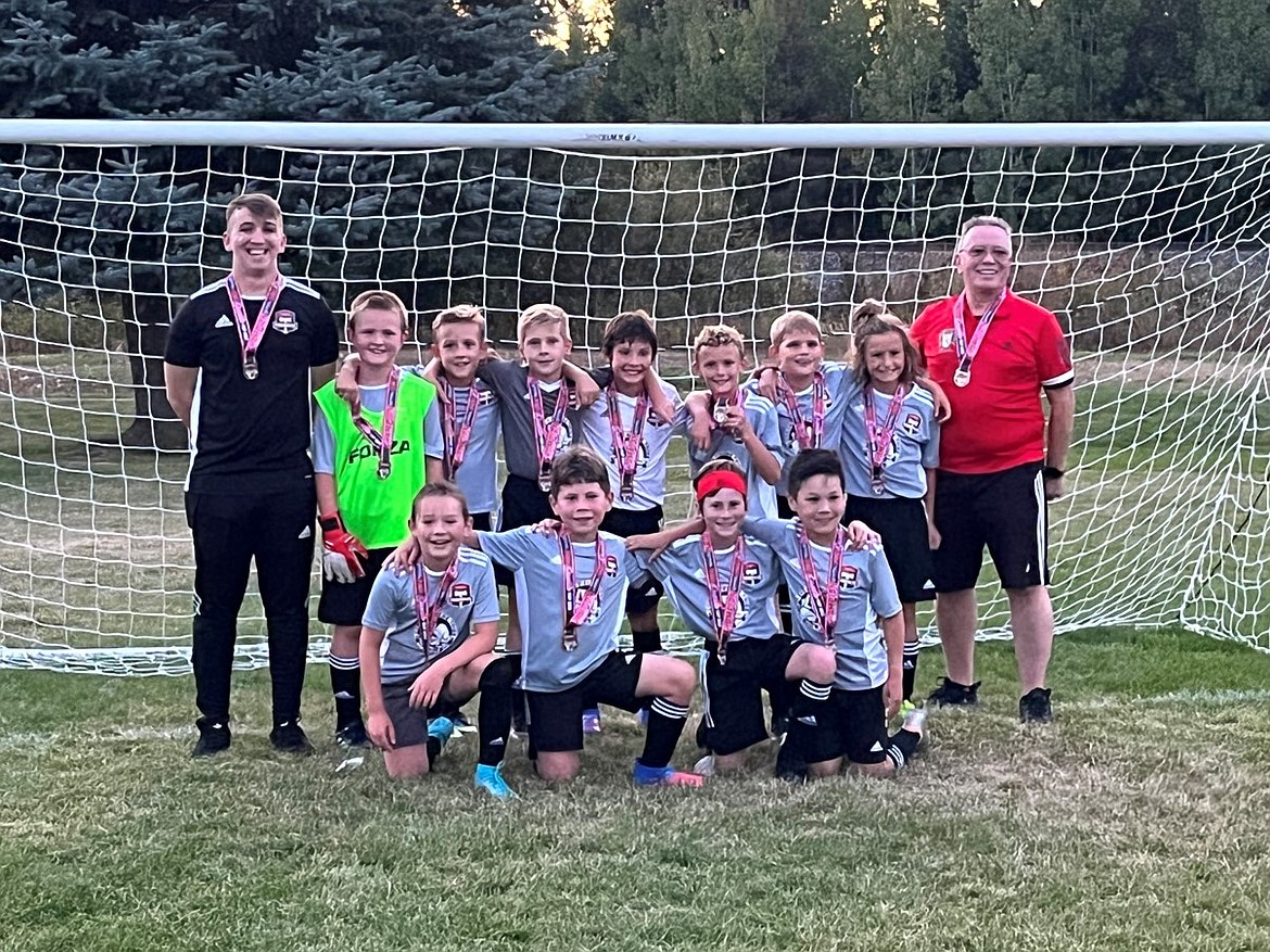 Courtesy photo
On Sept. 27, the Timbers North FC 2013 Boys Black soccer team got to play their postponed Gold Bracket Pend Oreille Cup championship game against the Sandpoint Strikers. The game ended with a 4-4 tie and after nine penalty kicks, the Timbers emerged victorious. In the front row from left are Asher Engles, Asher Witherwax, Maverick Sargent and Levi Pooler; and back row from left, coach Bailey O’Neil, Patrick Langer, Xander Weeks, Phoenix Soto, Aiden Mojzis, Luke Baune, James Doalson, Sullivan O’Dowd and coach John O’Neil.