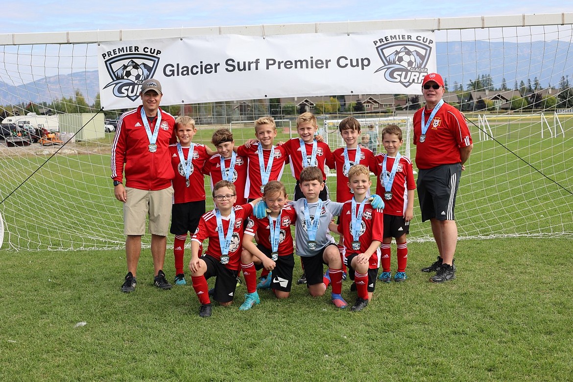 Courtesy photo
On Sunday, the Timbers North FC Boys Green soccer team won its bracket at the Glacier Surf Premier Cup Tournament in Whitefish, Mont. The championship game against the Sandpoint Monarchs was 2-0 victory, with goals scored by Xander Weeks and Nolan Bode. In the front row from left are Liam Jell, Asher Engles, Asher Witherwax and Nolan Bode; and back row from left, assistant coach Chad Kuhlmann, James Doalson, Hudson Herbert, Xander Weeks, Phoenix Soto, Owen Irwin, Bridger Gatten, and coach John O’Neil.