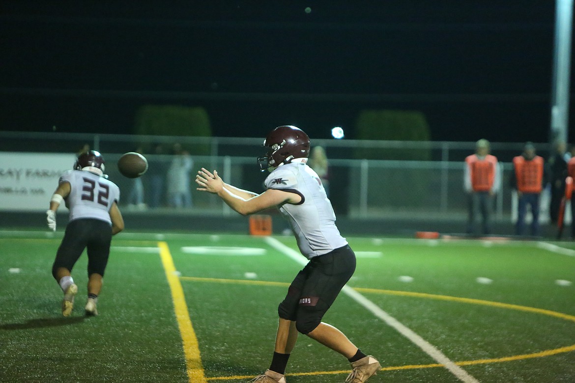 Wahluke quarterback Andrew Yorgesen takes the snap late in the game against Royal on Friday.
