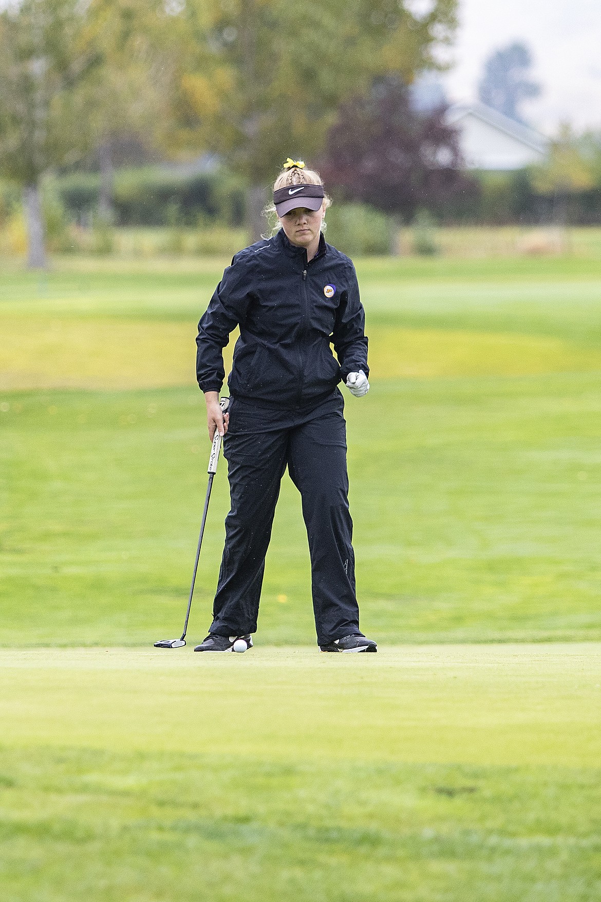 Lady Pirate Ashley Maki watches her putt drop into the cup on hole #10 during the Class A State Championship hosted at the Hamilton Gulf Club on Saturday. (Rob Zolman / Lake County Leader)