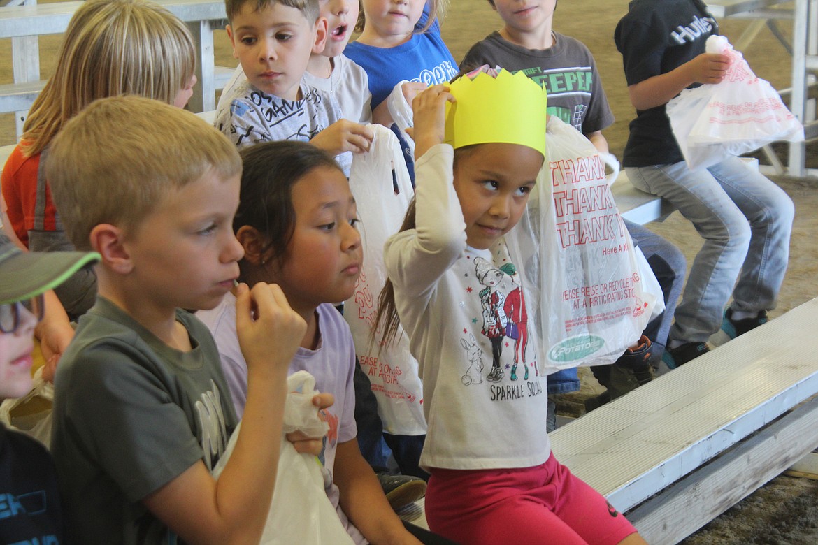 First-graders had the chance to win a crown while learning about honeybees Tuesday at First Grade Farm Day.