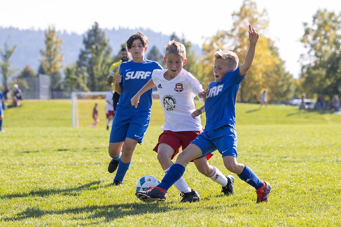 Photo by BUSCEMA PHOTOGRAPHY
The Timbers North FC 11 Boys Premier soccer team played two games last weekend. The Timbers lost the morning game to the Sandpoint Strikers 2011B, then defeated EW Surf SC B11/12 4-2 in the afternoon game. Timbers goals were scored by Orin Poole (3) assisted by Ryder Quinn, Bode Barton on a header from Lucas Buscema and Damon Mysse from Lucas Buscema. Pictured above in white is Kellan Alexander of the Timbers.