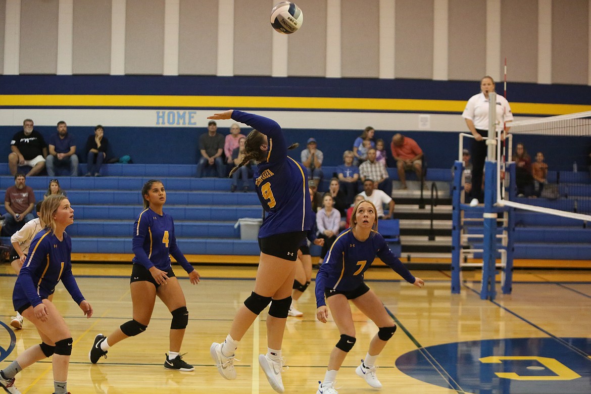 Wilson Creek sophomore Neeley Odorizzi jumps to attempt a spike against Waterville-Mansfield.