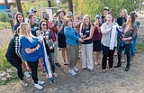 Land to Hand celebrates new home at junior high
