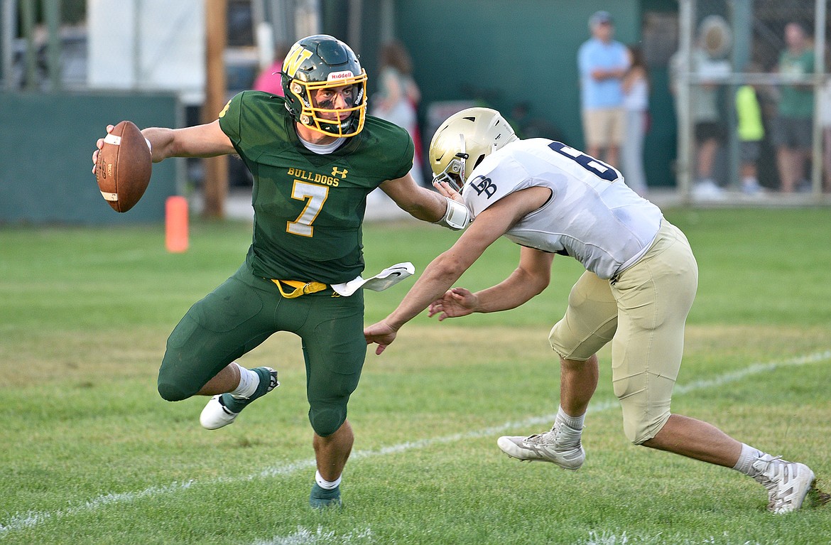 Whitefish’s Fynn Ridgeway has always been a dual-threat quarterback, and through six games he has the most rushing yards in the state, regardless of class.(Whitney England/Whitefish Pilot)