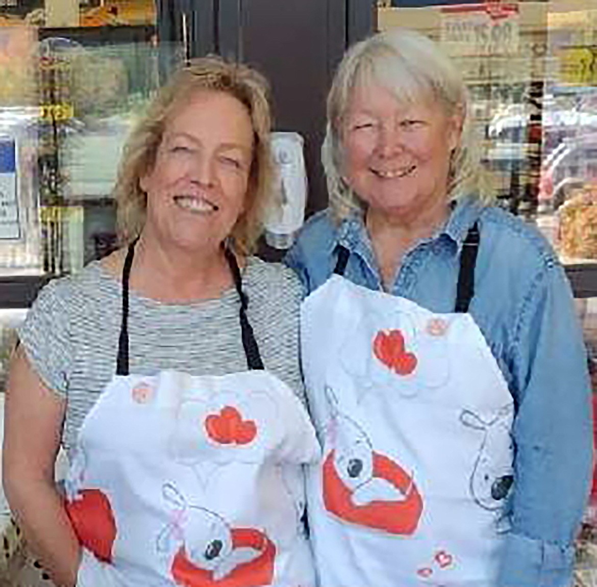 Deborah Griffin and Lori Werder are pictured at the bake sale.