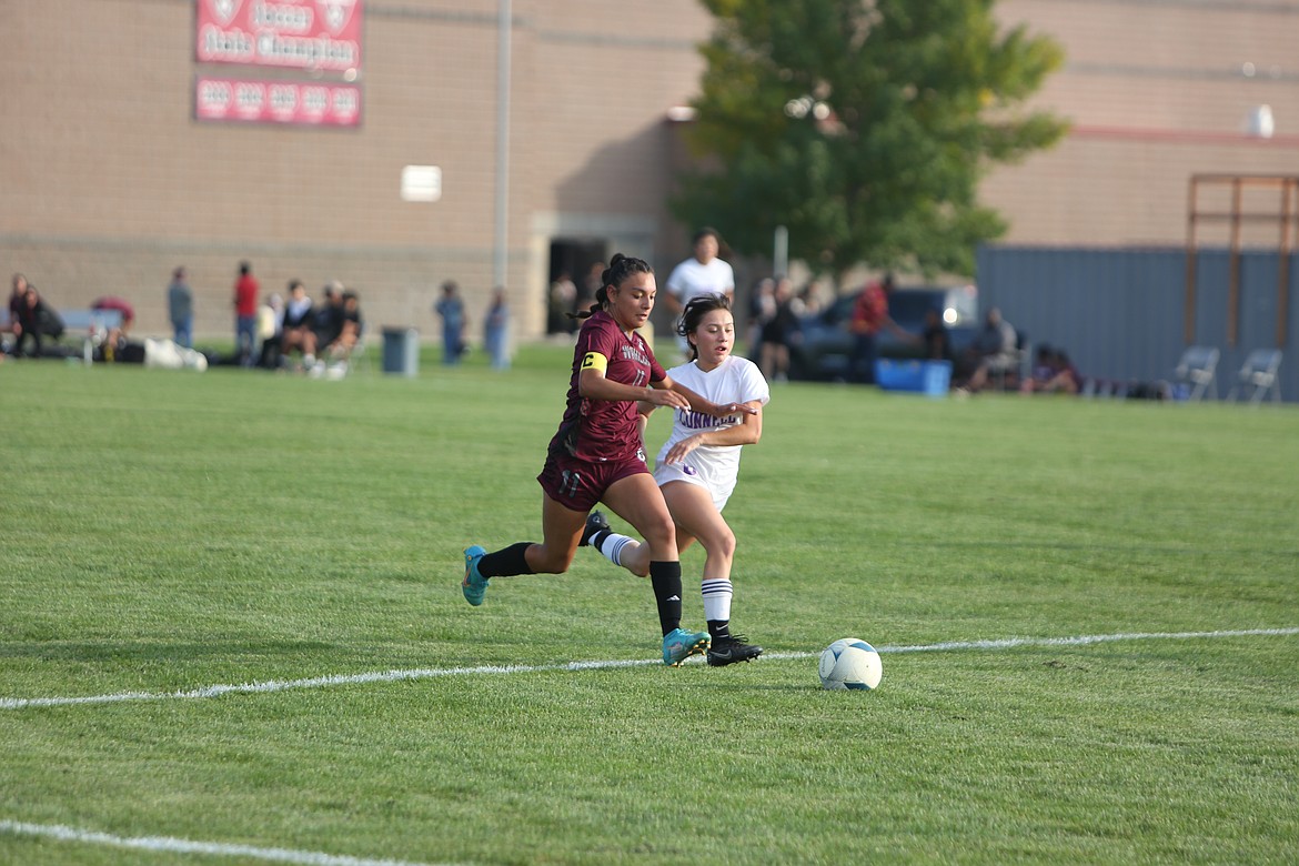 Wahluke senior Hiselle Bernal races past a Connell defender on her way to take a shot on the net.