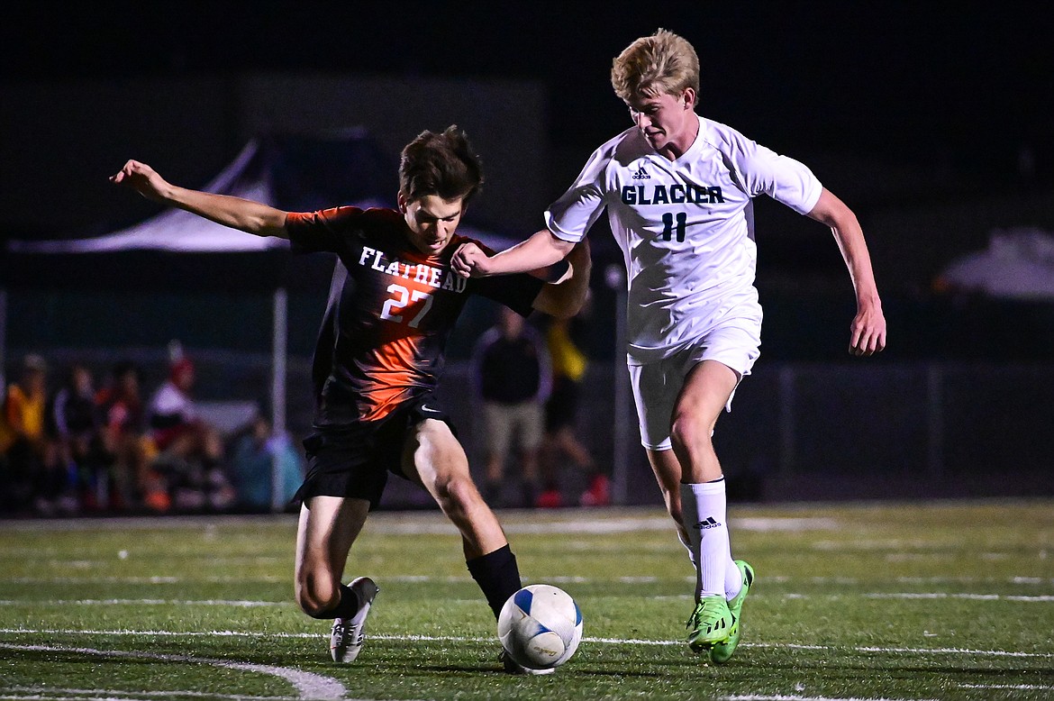 Glacier's Liam Ells (11) makes a run at the goal for a first-half score against Flathead at Legends Stadium on Thursday, Oct. 6. (Casey Kreider/Daily Inter Lake)