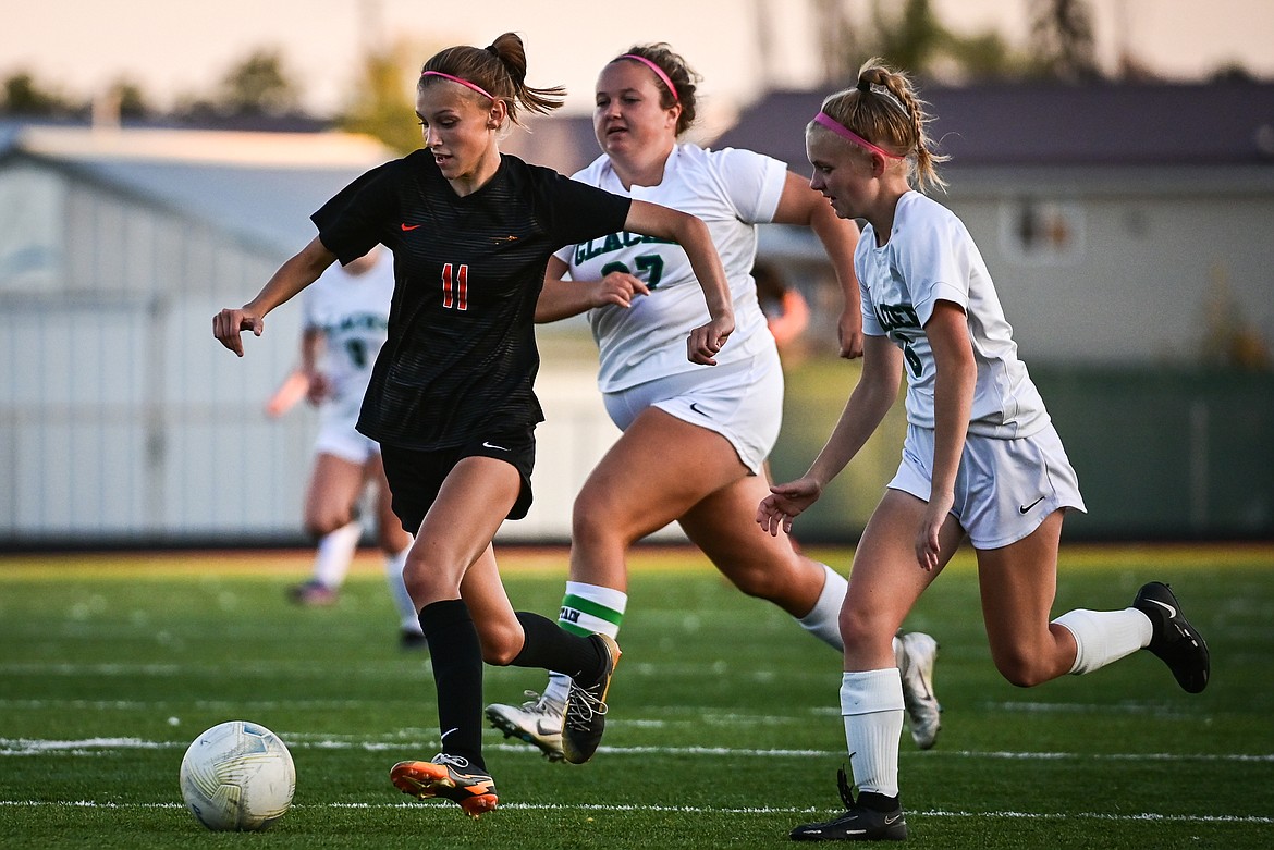 Flathead's Mia Stephan (11) pushes the ball upfield in the first half against Glacier at Legends Stadium on Thursday, Oct. 6. (Casey Kreider/Daily Inter Lake)