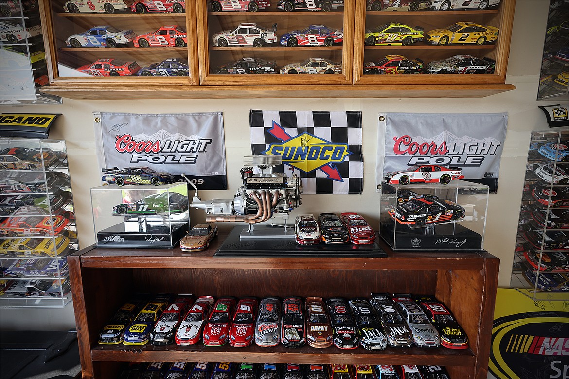 Miniature NASCAR race cars proudly displayed in the garage of Kalispell's Kevin Bach. (Jeremy Weber/Daily Inter Lake)