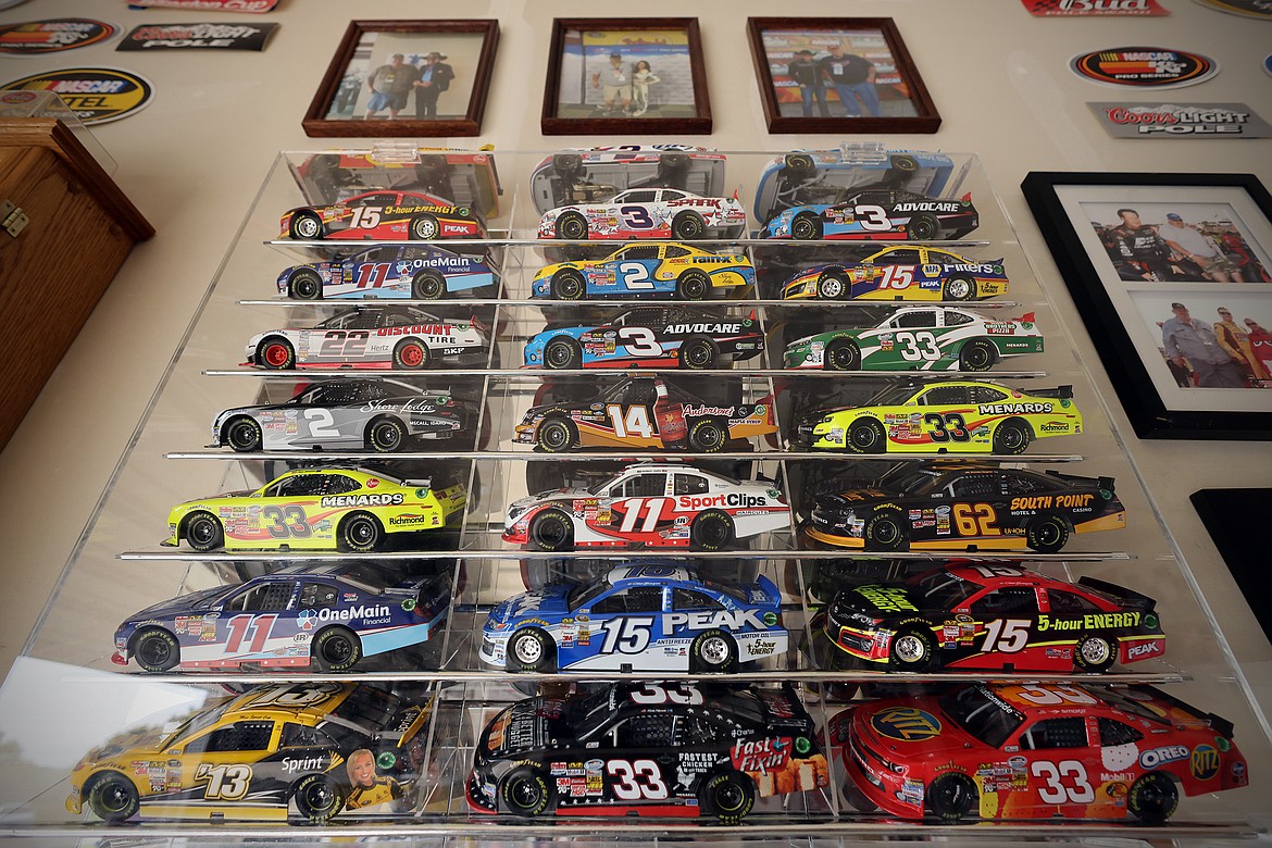 Miniature NASCAR race cars proudly displayed in the garage of Kalispell's Kevin Bach. (Jeremy Weber/Daily Inter Lake)