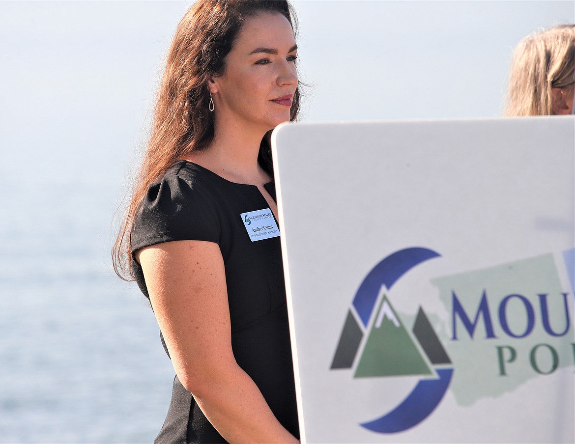 Amber Gunn, lead policy analyst for Mountain States Policy Center, listens during the nonprofit's kickoff event at Independence Point on Thursday.