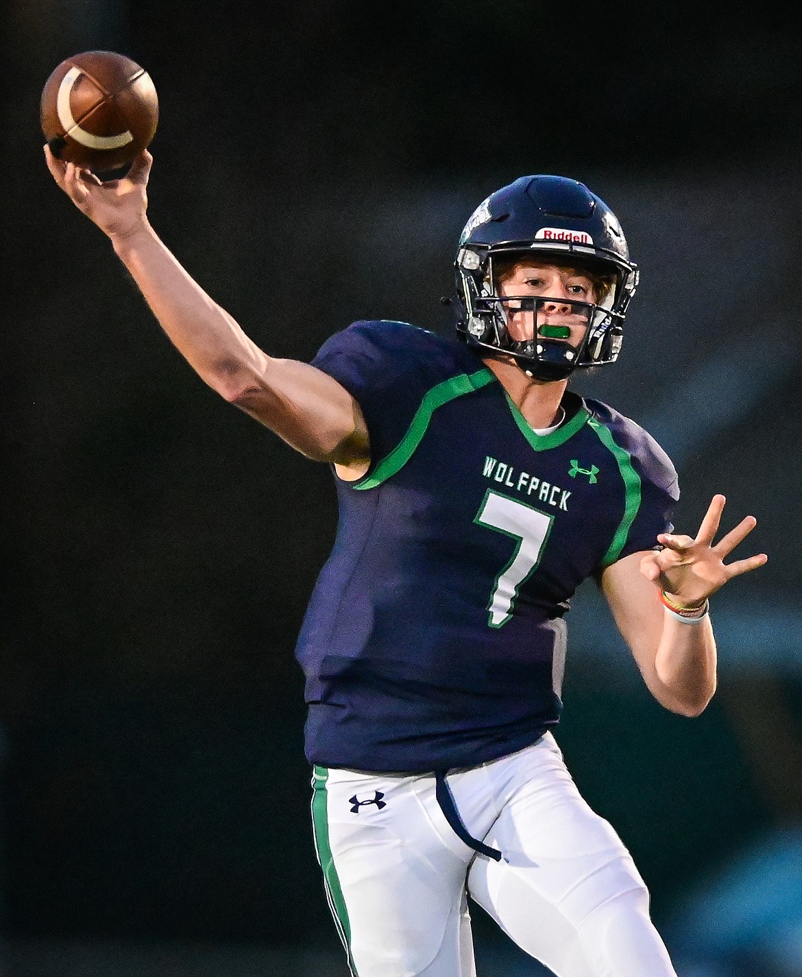 Glacier quarterback Gage Sliter (7) looks for an open receiver in the first half against Butte at Legends Stadium on Friday, Oct. 7. (Casey Kreider/Daily Inter Lake)