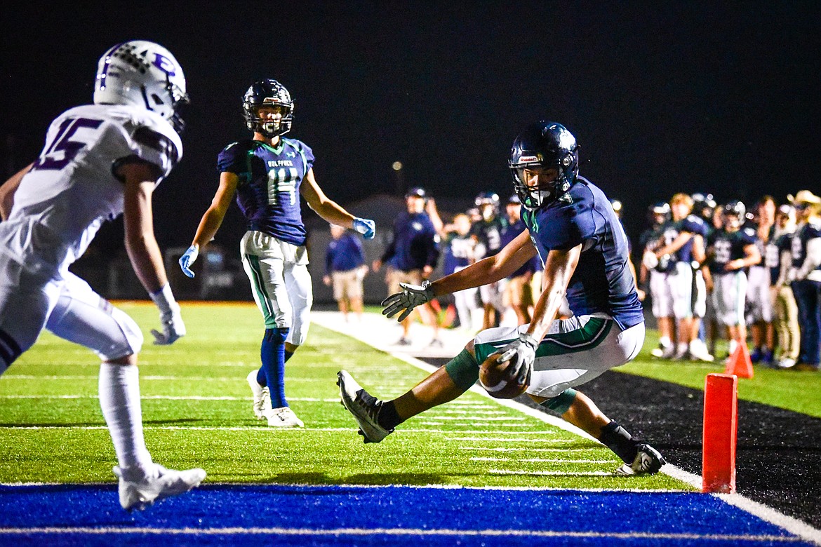 Glacier wide receiver Kole Johnson (4) tries to extend the ball across the goal line after a reception in the third quarter against Butte at Legends Stadium on Friday, Oct. 7. (Casey Kreider/Daily Inter Lake)