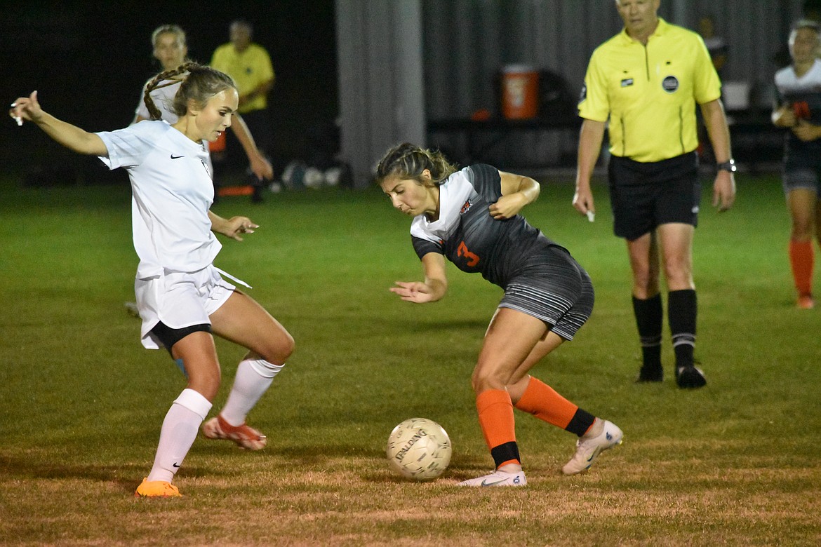 Ephrata High School junior Aliya Avila (3) faces off with a Selah player during the conference matchup on Thursday.