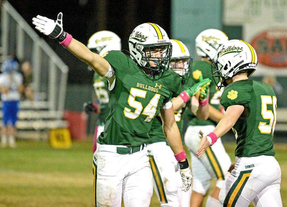 Bulldog Scotty Dalen celebrates a first down for Whitefish during a game against Libby on Friday at the Dawg Pound. (Whitney England/Whitefish Pilot)