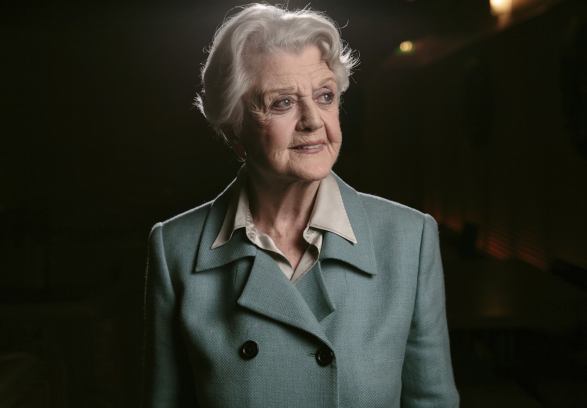 Angela Lansbury poses for a portrait during press day for "Blithe Spirit" in Los Angeles on Dec. 16, 2014. Lansbury, the big-eyed, scene-stealing British actress who kicked up her heels in the Broadway musicals “Mame” and “Gypsy” and solved endless murders as crime novelist Jessica Fletcher in the long-running TV series “Murder, She Wrote,” died peacefully at her home in Los Angeles on Tuesday. She was 96. (Photo by Casey Curry/Invision/AP, File)