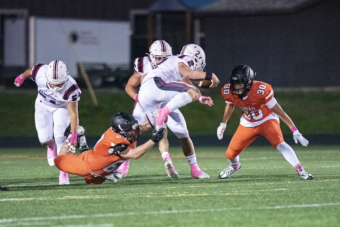 Ronan Chief Coleton Sherman makes a toe grabbing tackle. (Rob Zolman/Lake County Leader)