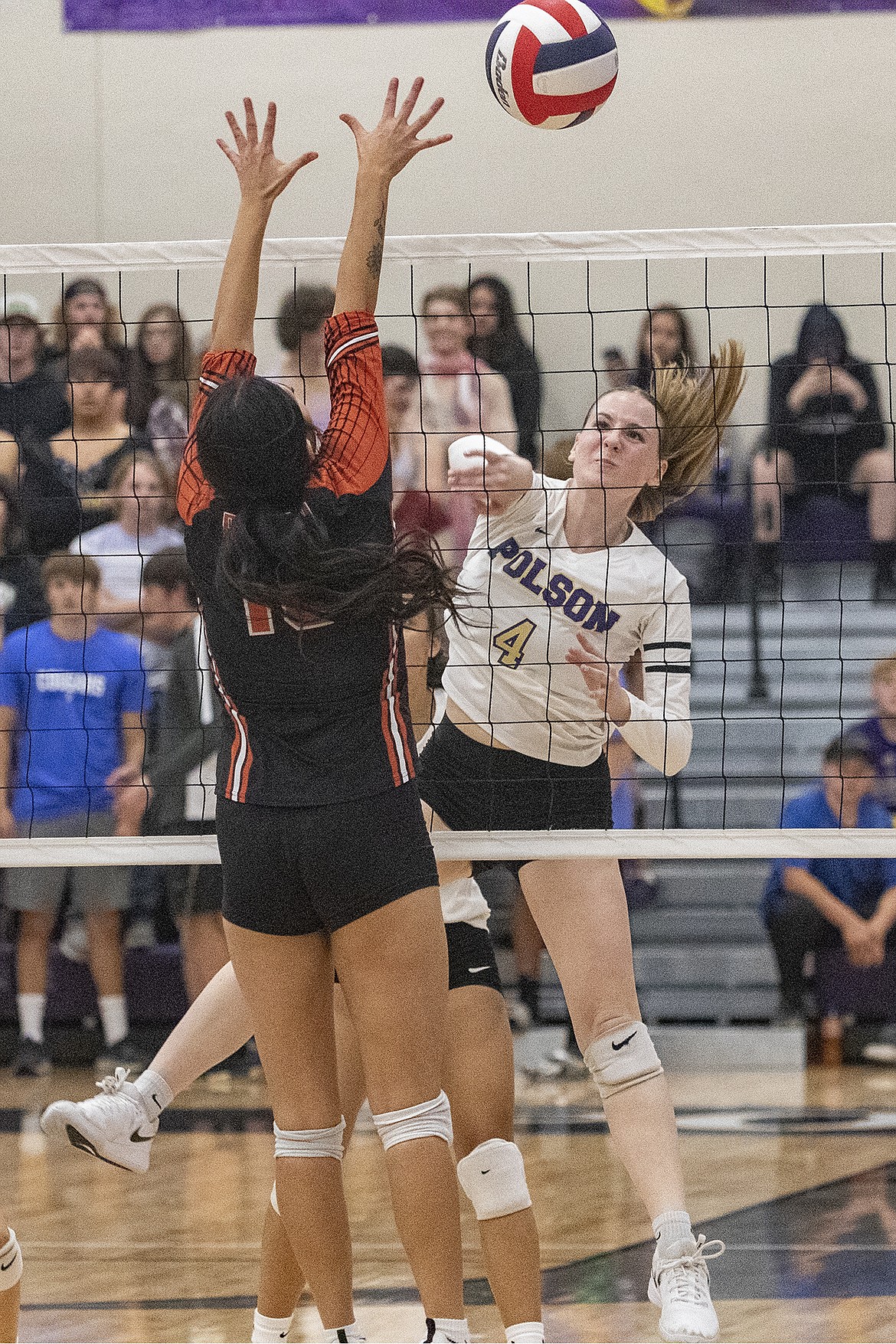 Lady Pirate Hannah Simpson (4) spikes the ball. (Rob Zolman/Lake County Leader)