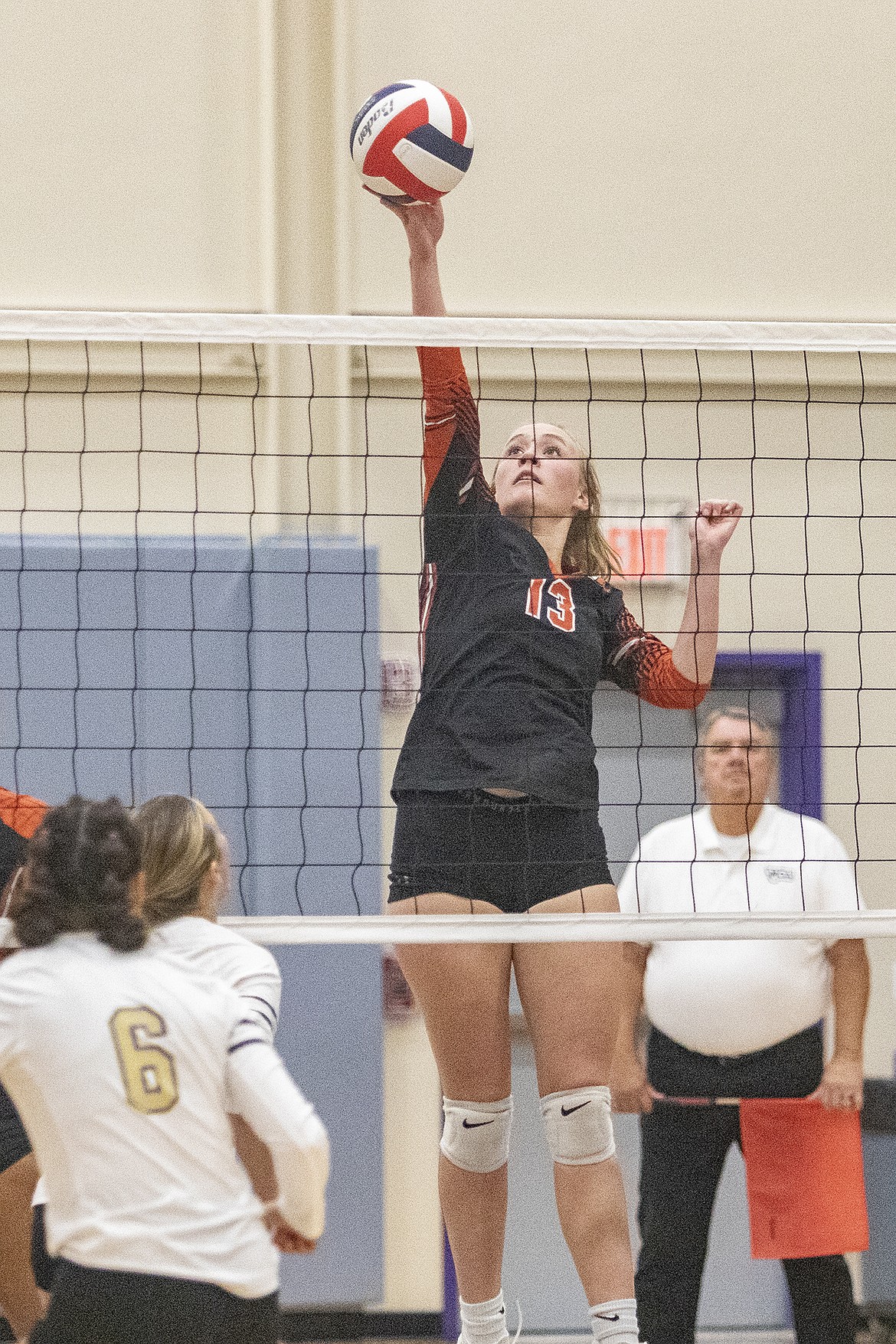 Ronan Maiden Jace Frost hits the ball past Lady Pirate defenders. (Rob Zolman/Lake County Leader)