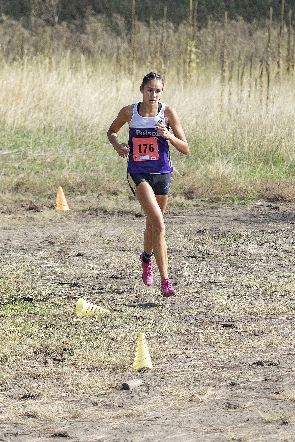 Polson Lady Pirate Ashtyn Wagner races to a first-place finish with a time of 20:27 during the Mission Shadow Duels hosted at the Silver Fox Golf Course in Pablo on Saturday.	(Rob Zolman/Lake County Leader)