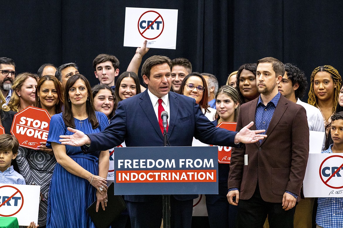 Florida Gov. Ron DeSantis addresses the crowd before publicly signing HB7, "individual freedom," also dubbed the "Stop Woke" bill during a news conference at Mater Academy Charter Middle/High School in Hialeah Gardens, Fla., on Friday, April 22, 2022.