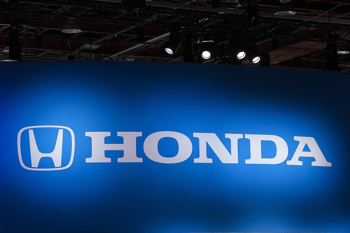 FILE - A Honda logo is shown at the North American International Auto Show in Detroit, Monday, Jan. 14, 2019. Honda says, Tuesday, Oct. 11, 2022, it will build a $3.5 billion joint-venture battery factory in rural southern Ohio and hire 2,200 people to staff it as it starts to turn the state into its North American electric vehicle hub. The company also plans to invest $700 million and add 300 jobs at three of its own Ohio factories to prepare them to start making EVs and components. (AP Photo/Paul Sancya, File)