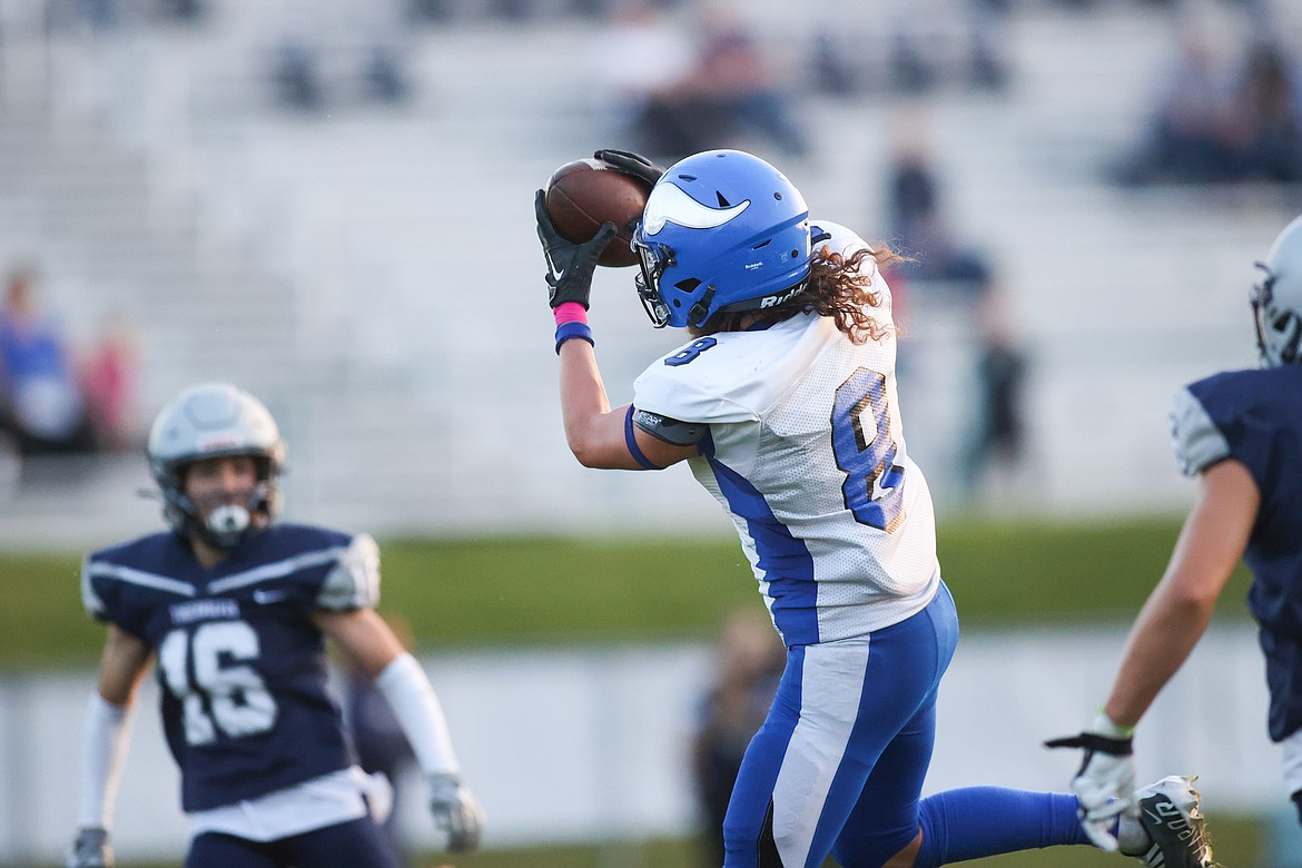 Photo by BUSCEMA PHOTOGRAPHY
Tucker Booth (8) of the Coeur d'Alene High junior varsity football team catches a touchdown pass in the Vikings' 44-0 win last Thursday at the Lake City JV. The Coeur d'Alene JV plays host to the Post Falls JV on Thursday at 6 p.m.