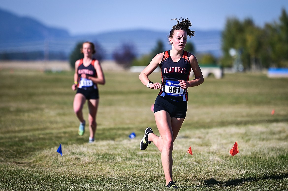 Flathead's Lilli Rumsey Eash leads teammate Madelaine Jellison during the Glacier Invite at Rebecca Farm on Wednesday, Oct. 12. (Casey Kreider/Daily Inter Lake)