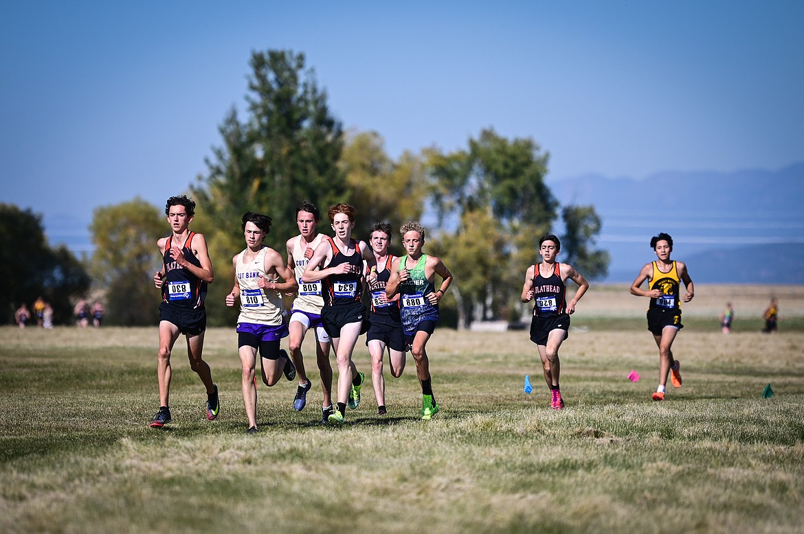 Flathead's Bauer Hollman, Kasen Kastner and Reilly Johnson and Glacier's Owen Thiel at the front of the pack during the Glacier Invite at Rebecca Farm on Wednesday, Oct. 12. (Casey Kreider/Daily Inter Lake)