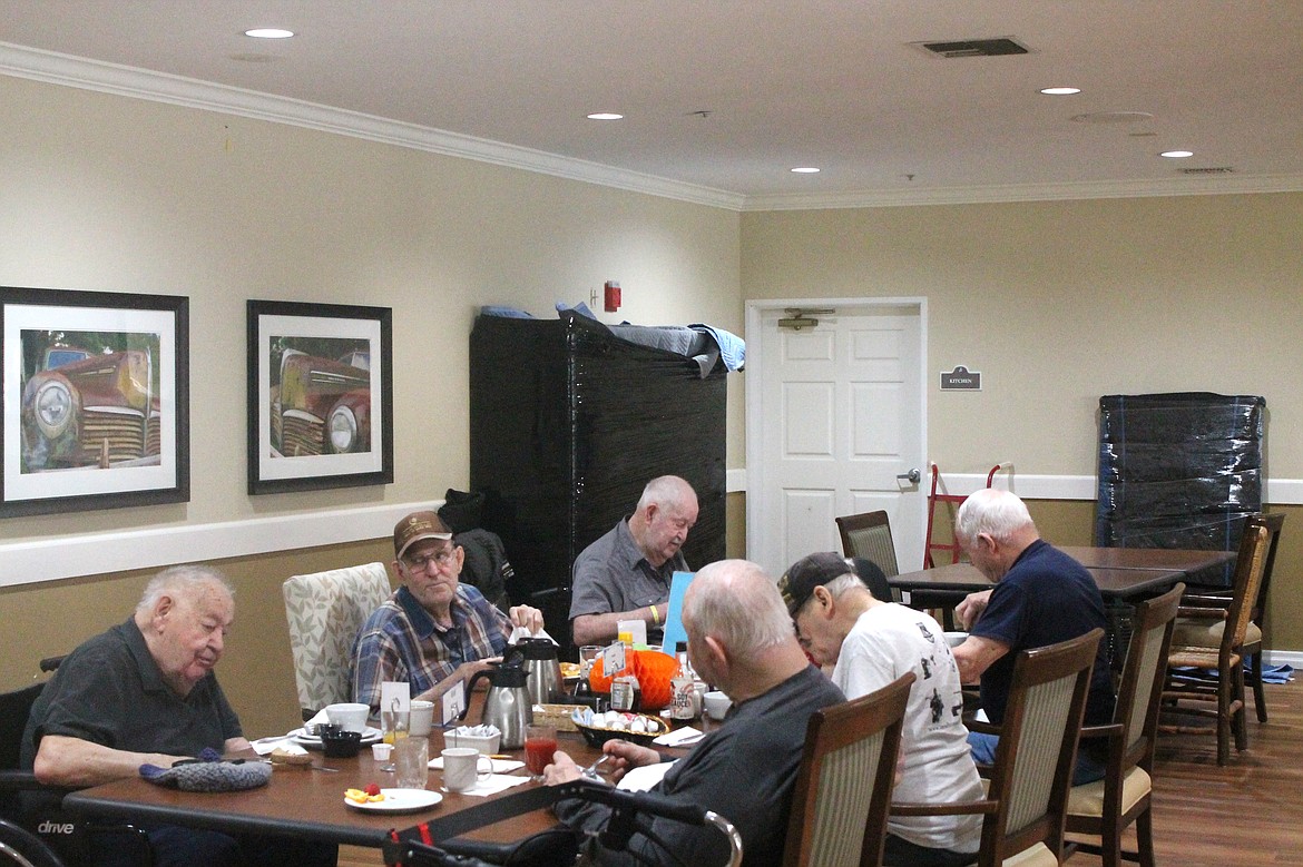 Residents at Brookdale Hearthstone enjoy breakfast Tuesday morning.