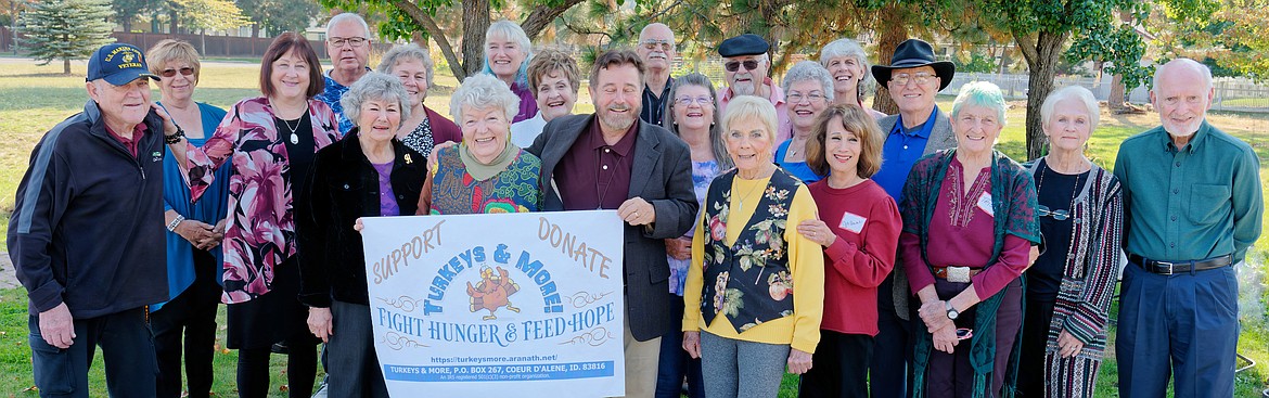 Members of Unity Center of Spiritual Growth gave Turkeys & More a big boost by donating a total of $5,625 to help buy Thanksgiving turkeys. Reverend Dennis Ashley, who is holding the sign, challenged the congregation to be a $5,000 diamond sponsor and they ended up being a Diamond Plus donor. Coordinator Evalyn Adams, who is also holding the sign, thanked the church for helping to provide turkeys for 1,800 vulnerable families this year. She estimated 7,000 people will enjoy a meal in their homes for this holiday. Adams said they feel blessed to have had so many wonderful donations from community members. The budget this year is $60,000 and contributors have helped to raise about $43,000 towards that goal.  People can still send a check made out to Turkeys & More to P.O. Box 267, CDA, ID 82816. Super 1 stores in Kootenai County will also be collecting donations soon to help provide gift cards which will enable people to buy the "trimmings" to go with their turkeys. Turkeys will be distributed on Nov. 18, at Unity Church in Coeur d'Alene.  If people have questions or would like to help they are encouraged to email Adams at evalynera@hotmail.com or call 208-765-5535, or call Turkeys & More President Bill Griffith at 208-446-4017.