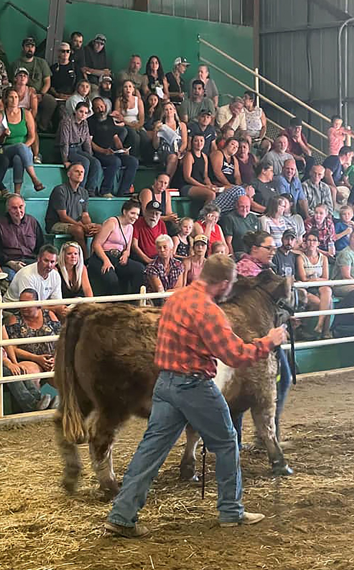 Taylor Widgren captured this Best Shot of Larissa Lippert giving Nic Peacock a hand at the Market Animal Sale at the 2022 Bonner County Fair. If you have a photo that you took that you would like to see run as a Best Shot or I Took The Bee send it in to the Bonner County Daily Bee, P.O. Box 159, Sandpoint, Idaho, 83864; or drop them off at 310 Church St., Sandpoint. You may also email your pictures in to the Bonner County Daily Bee along with your name, caption information, hometown and phone number to news@bonnercountydailybee.com.