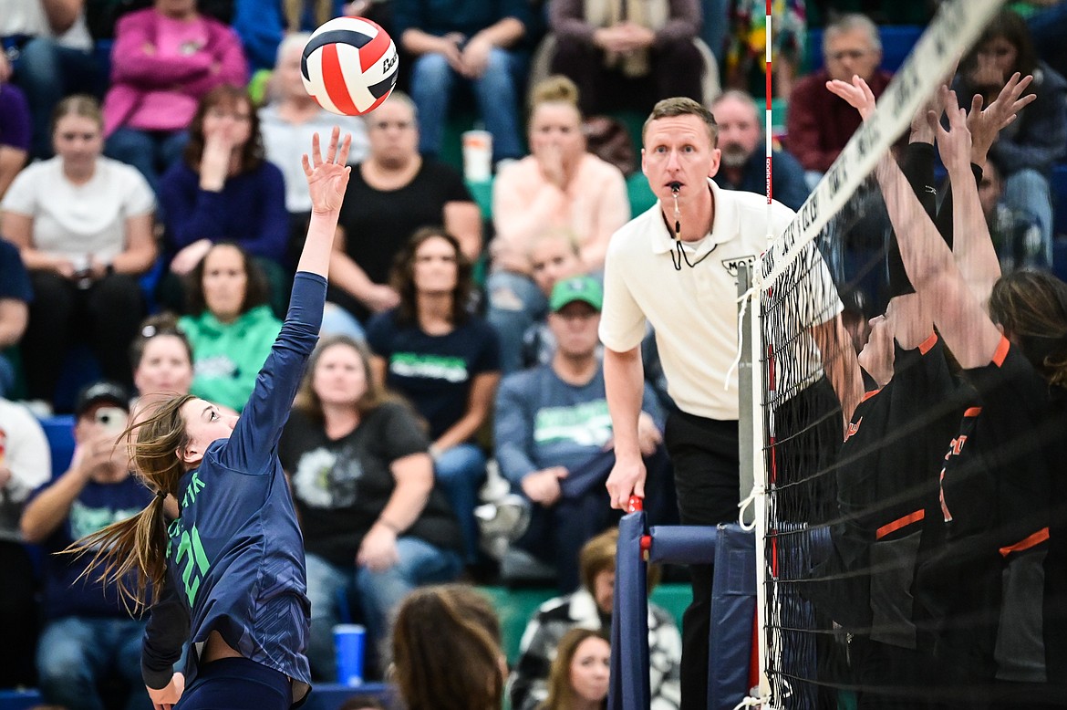 Glacier's Kaylei Fant (21) goes up for a kill against Flathead at Glacier High School on Thursday, Oct. 13. (Casey Kreider/Daily Inter Lake)