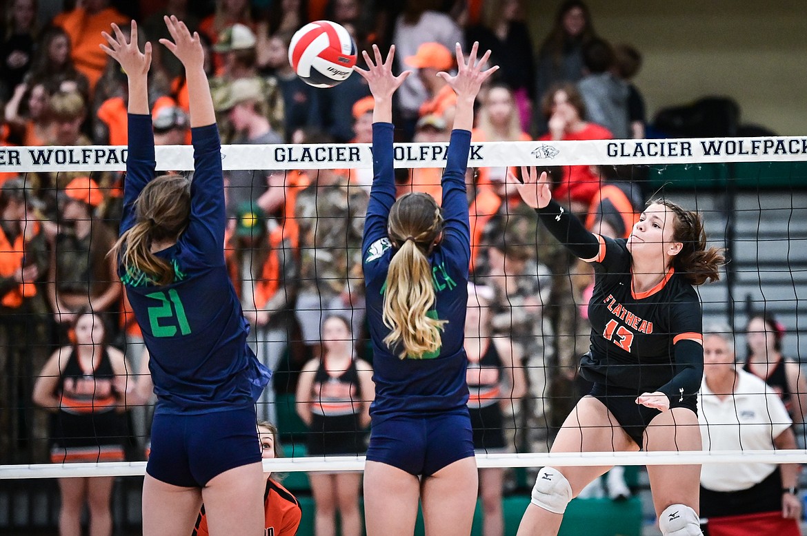 Flathead's Olive Lyngholm (13) goes up for a kill against Glacier at Glacier High School on Thursday, Oct. 13. (Casey Kreider/Daily Inter Lake)