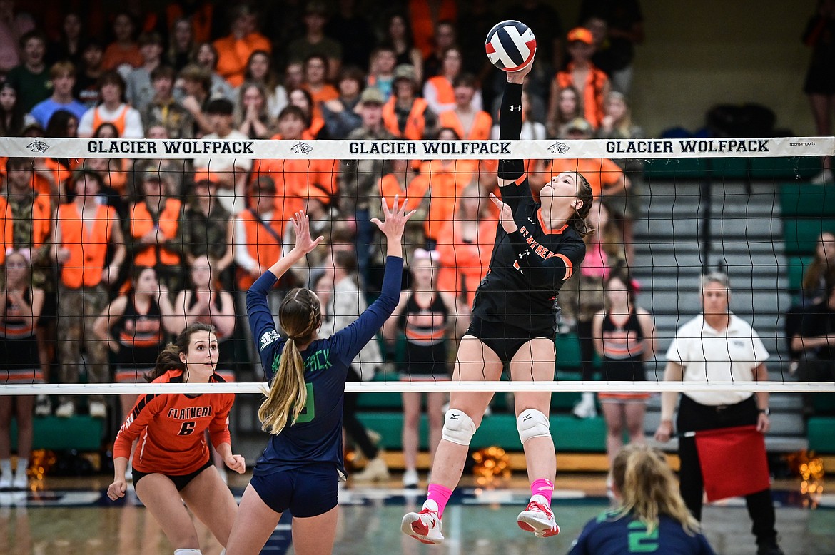 Flathead's Olive Lyngholm (13) goes up for a kill against Glacier at Glacier High School on Thursday, Oct. 13. (Casey Kreider/Daily Inter Lake)