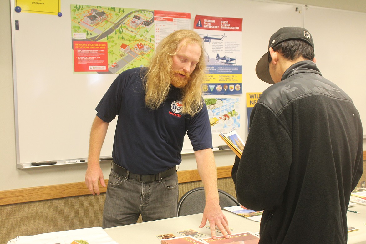 Jake Hardt talks about fire prevention with attendees at the Grant County Fire District 3 open house. Hardt said his firefighting career started as a volunteer with GCFD 3.