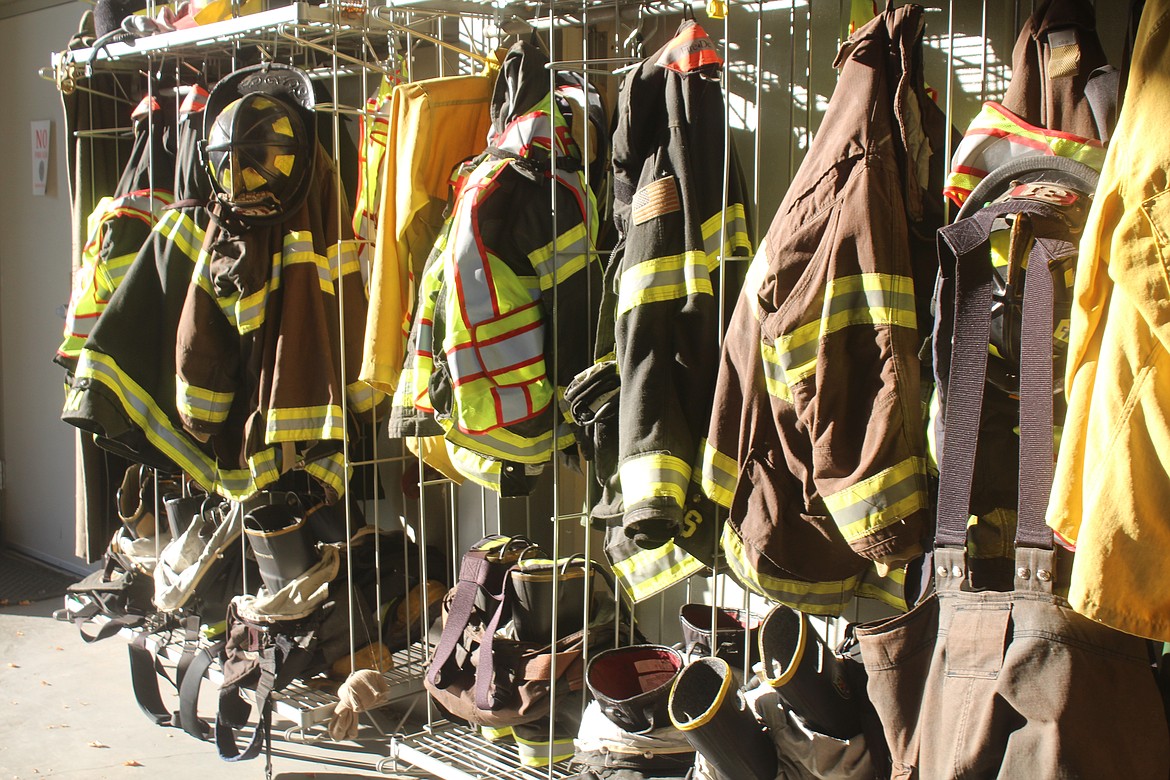 Turnouts fill the wall at Grant County Fire District 3 fire hall. GCFD 3 has been serving Grant County for eight decades now.