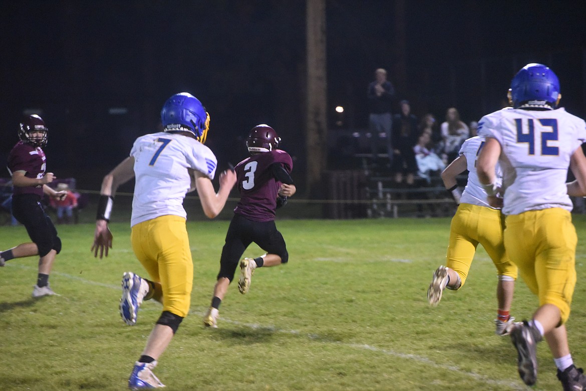 Troy freshman Carson Orr heads to the end zone for a 40-yard touchdown catch from classmate David Avidya on Friday, Oct. 14. (Scott Shindledecker/The Western News)