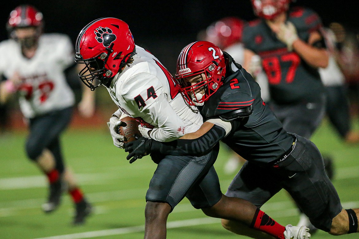 Levi Balison tackles a Mosbow running back as Sandpoint blanked the Bears, 67-0.