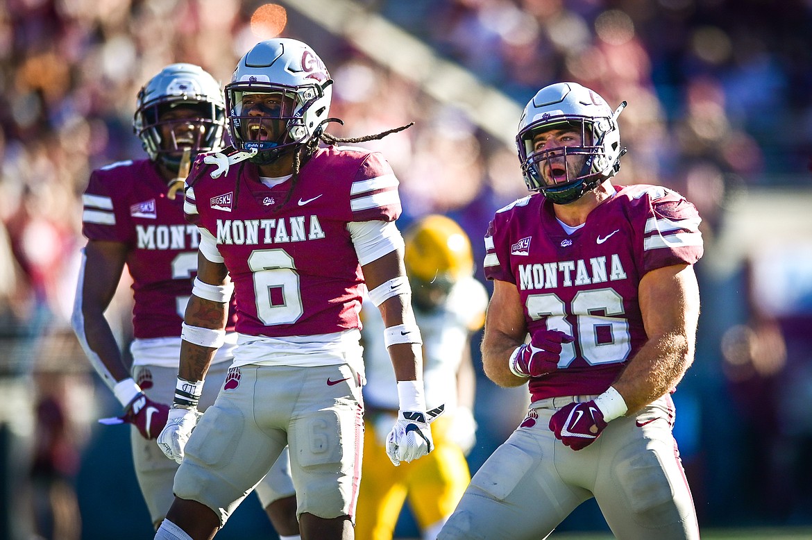 Montana defenders Justin Ford (6) and Levi Janacaro (36) celebrate after a stop in the fourth quarter against Idaho at Washington-Grizzly Stadium on Saturday, Oct. 15. (Casey Kreider/Daily Inter Lake)