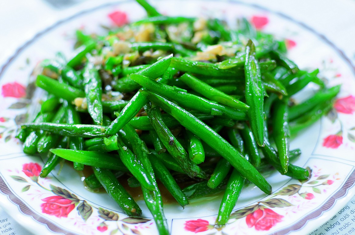 Green beans are plentiful now, and can be dressed up or served accented with fresh herbs.